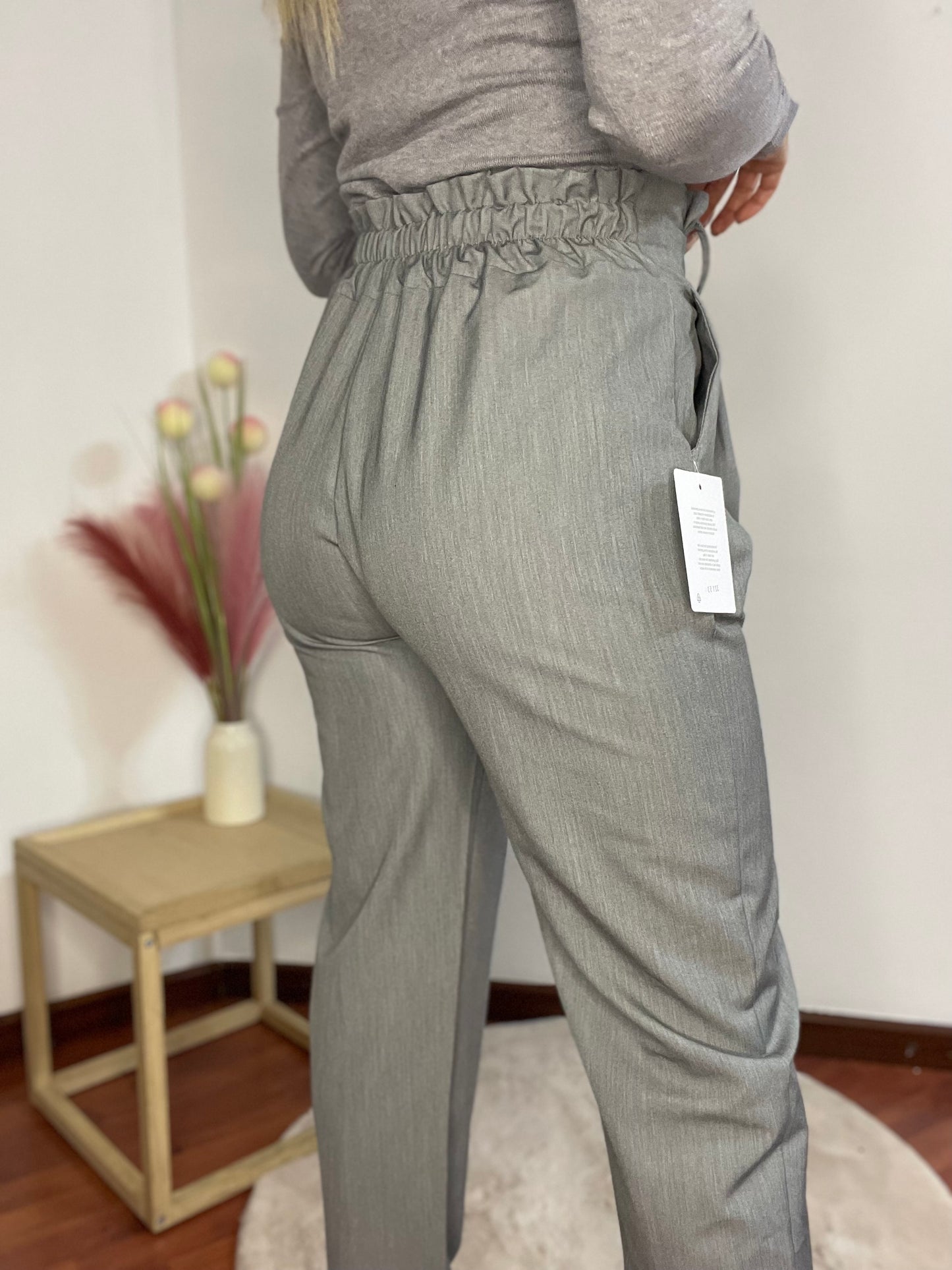 Pantalone con cintura laterale
